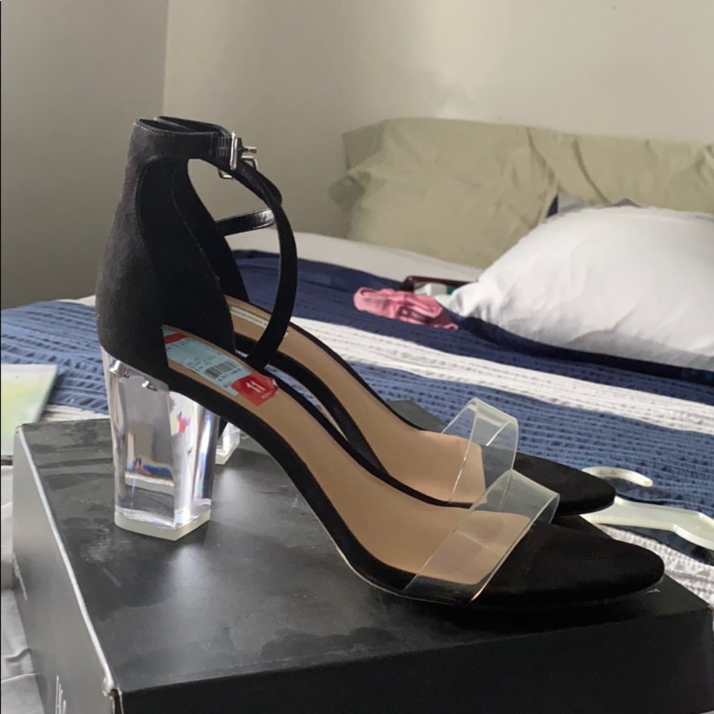 Black in clear heels